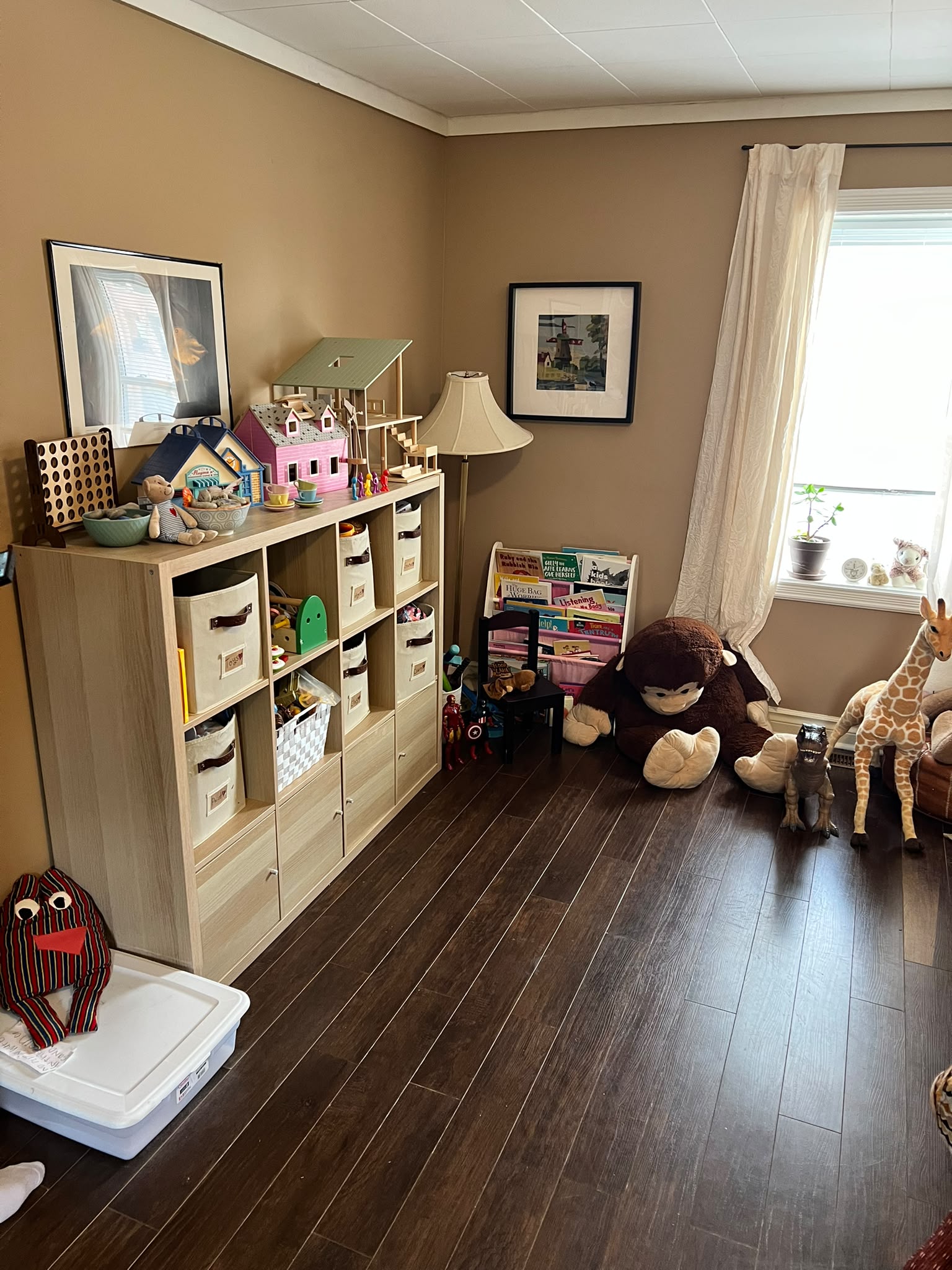 Therapy room with books, toys, and a play area